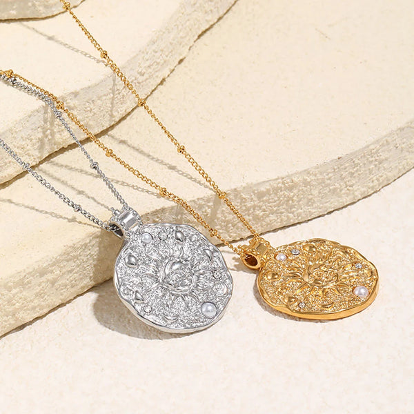 Silver sun medallion