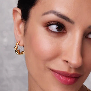Twisted gold hoops