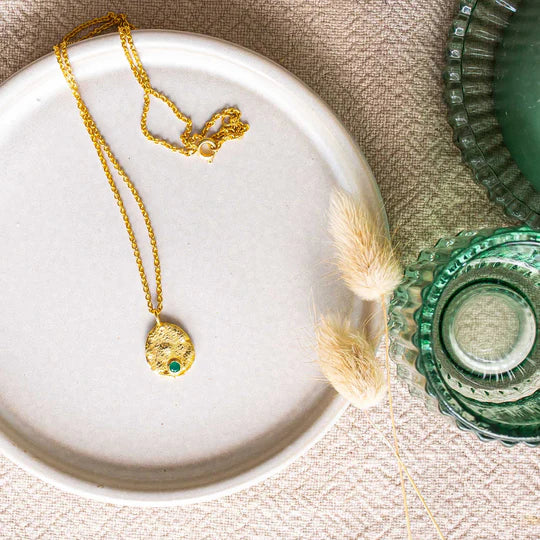 Gold coin necklace with green onyx stone