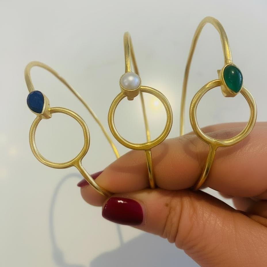 Bangle bracelets with semi-precious stones